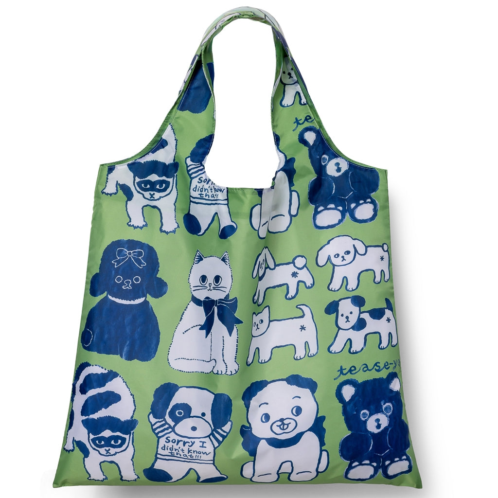 Green reusable bag with blue and white animal illustrations on a white background