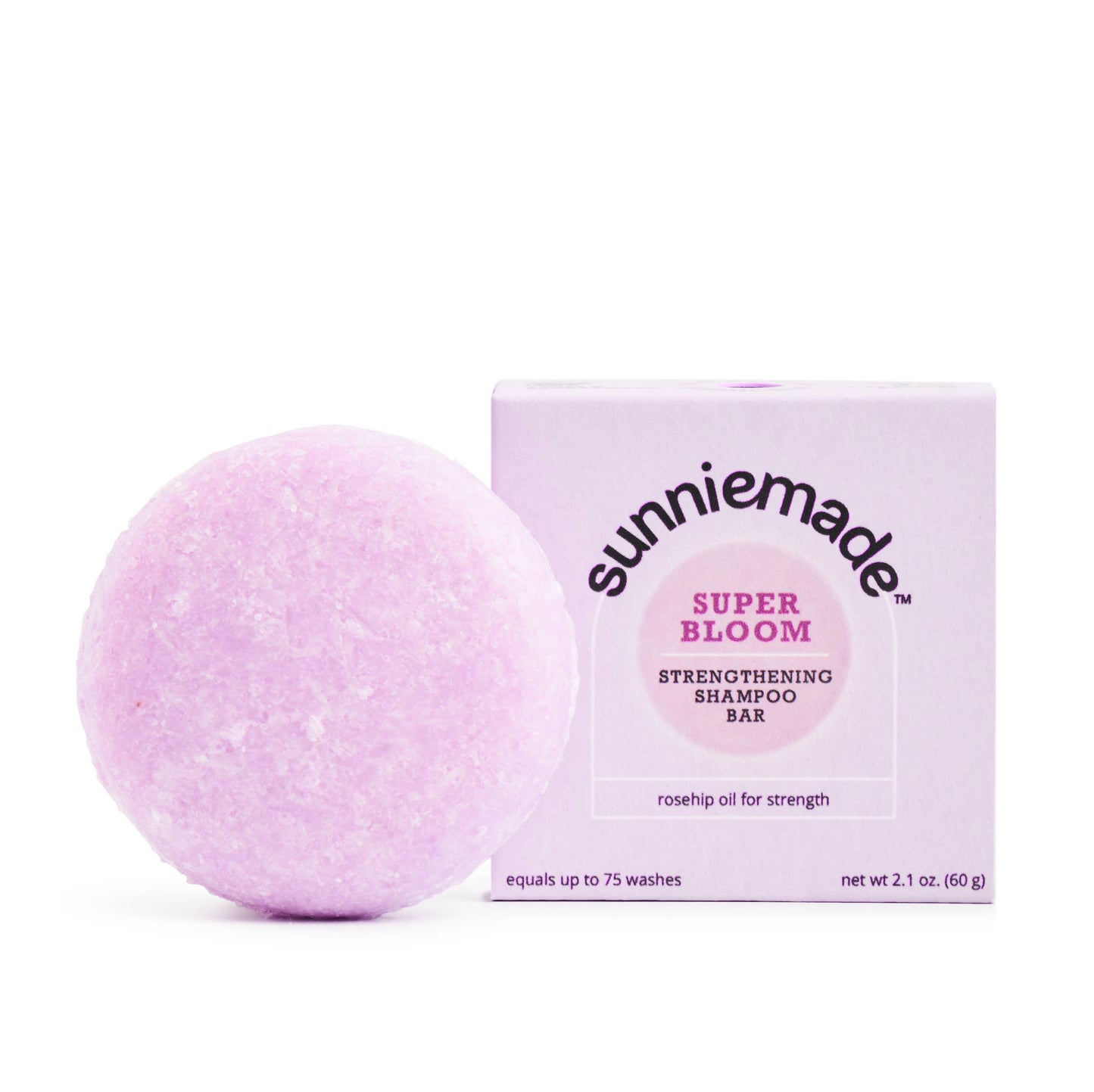 Purple shampoo bar with packaging labeled 'sunniemade Super Bloom' on a white background
