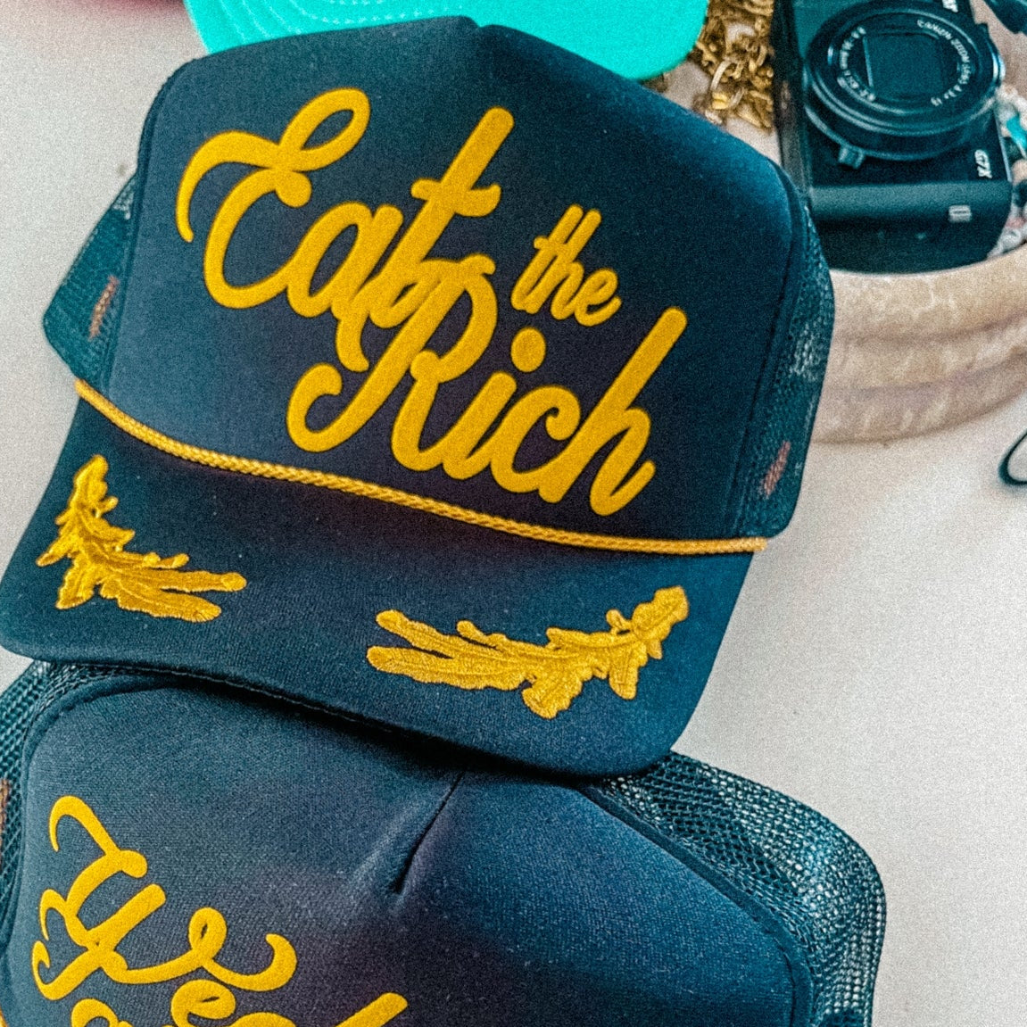 Eat The Rich Trucker Hat